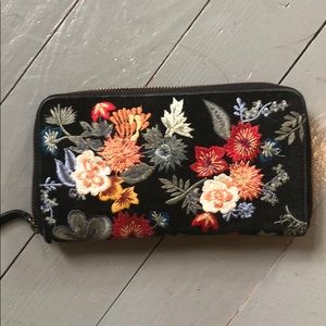 Embroidered wallet.